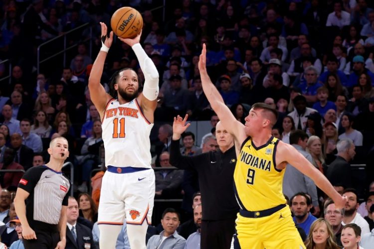 Jalen Brunson shoots over Indiana's T.J. McConnell in the Knicks' 121-117 playoff win on Monday. ©AFP